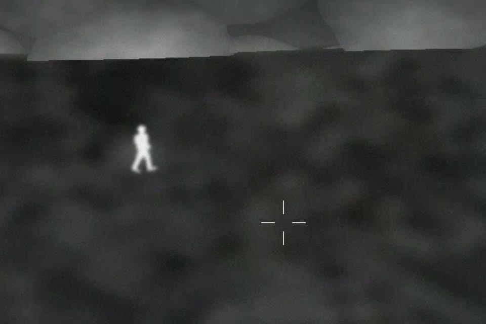 Termisk bilde av en person i varslingsområdet